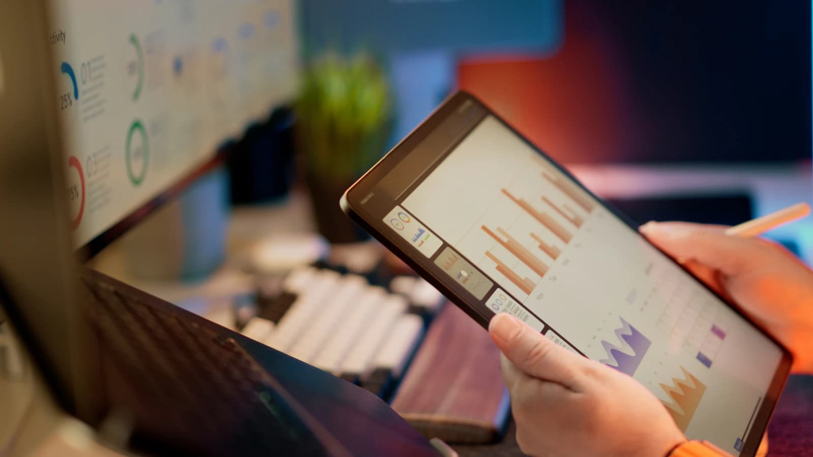 An analyst reviewing privacy risk scores on a tablet dashboard